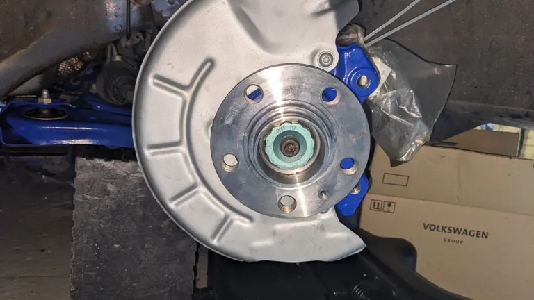 Preparation and installation of brake disc splash plates for Brembo 17Z calipers