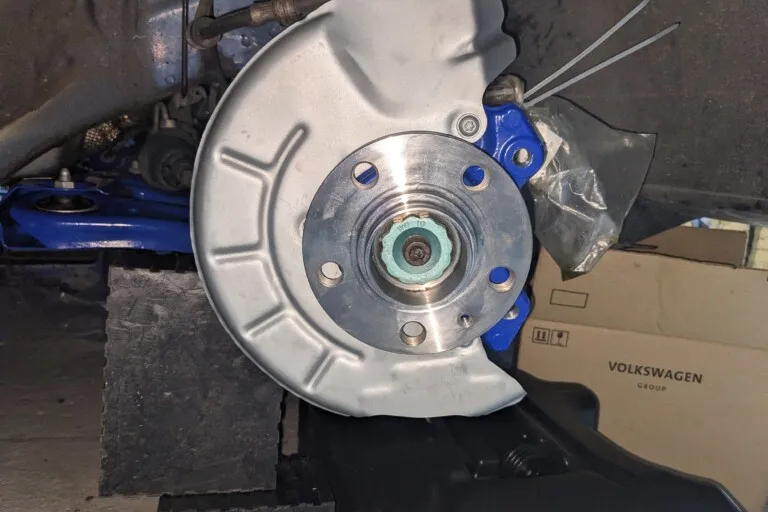 Preparation and installation of brake disc splash plates for Brembo 17Z calipers