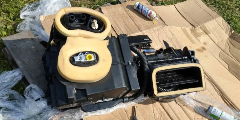 Removing heater and air conditioning unit