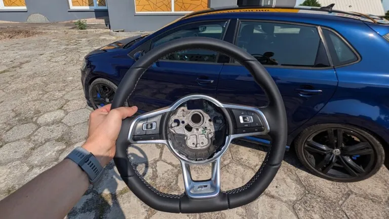 Steering wheel reupholstered with leather