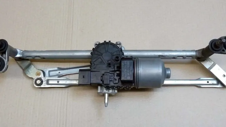 Removing wiper frame with linkage and wiper motor