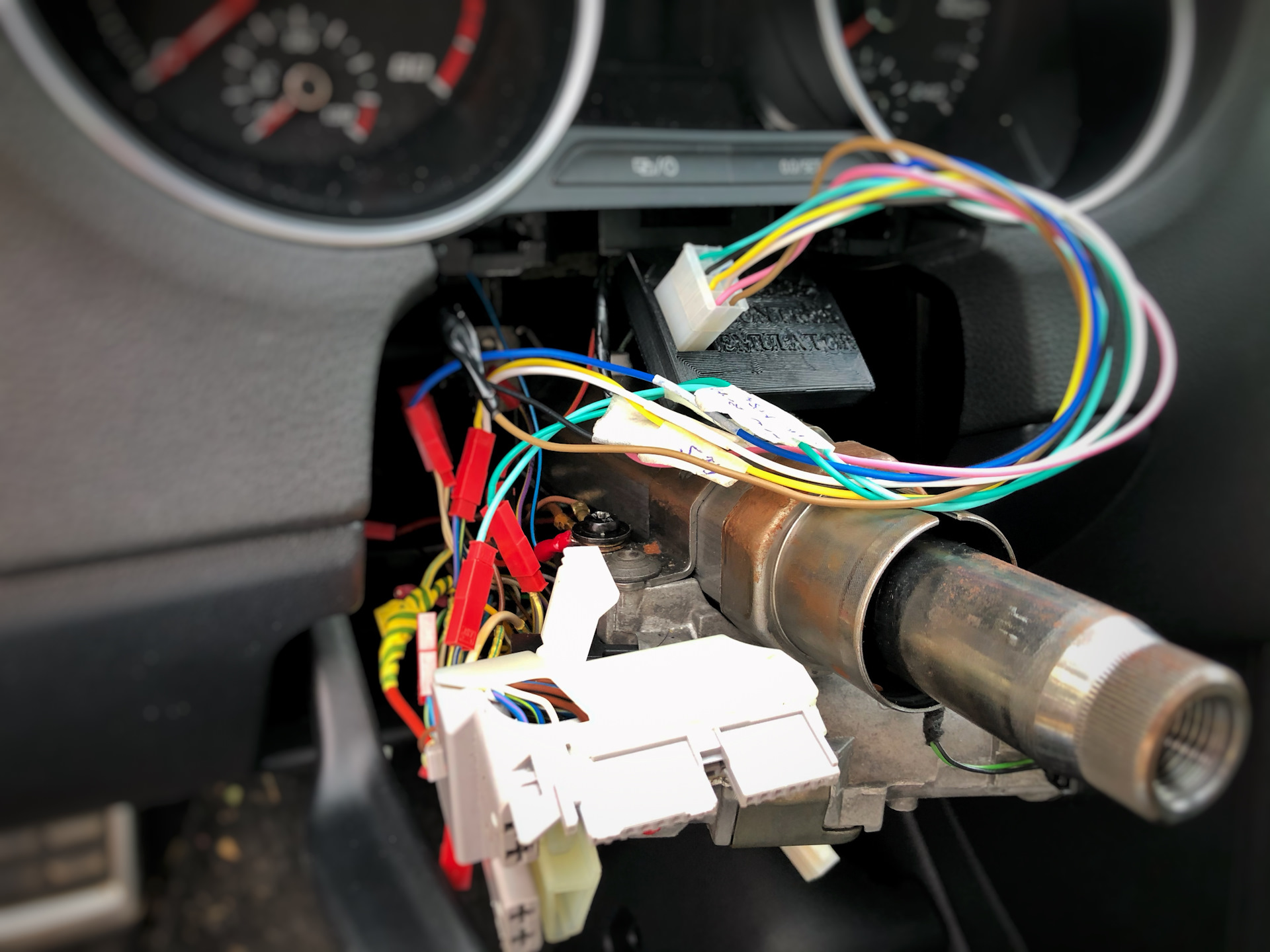 The emulator connected to the cruise control wires at the T41 connector